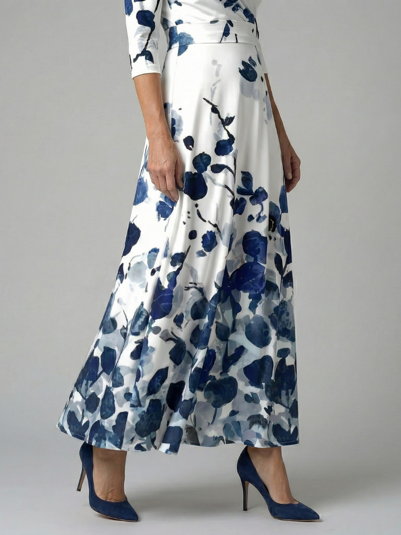 Celeste | Vestido Midi Floral con Escote Cruzado y Manga Tres Cuartos