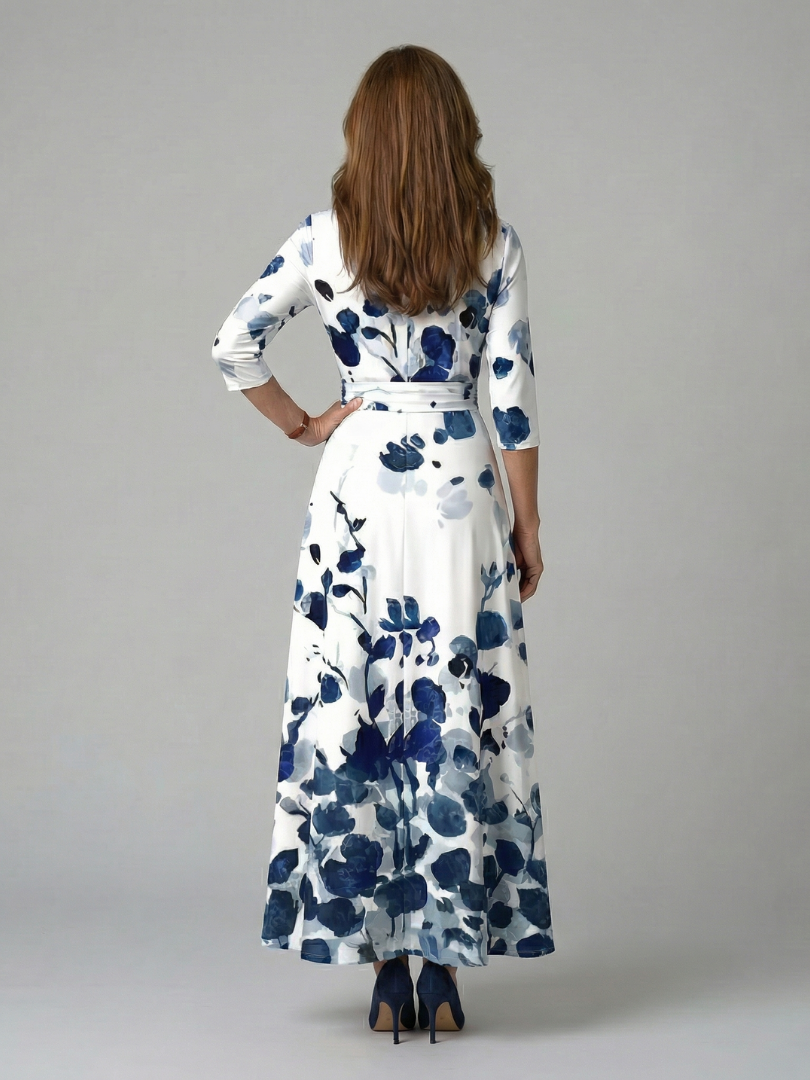 Celeste | Vestido Midi Floral con Escote Cruzado y Manga Tres Cuartos